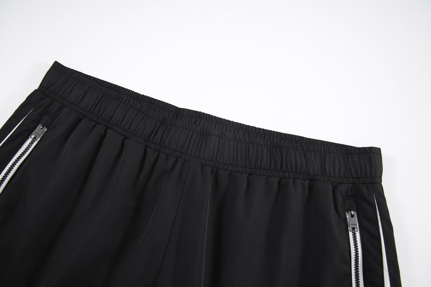 ZIP OFF TRACK PANTS