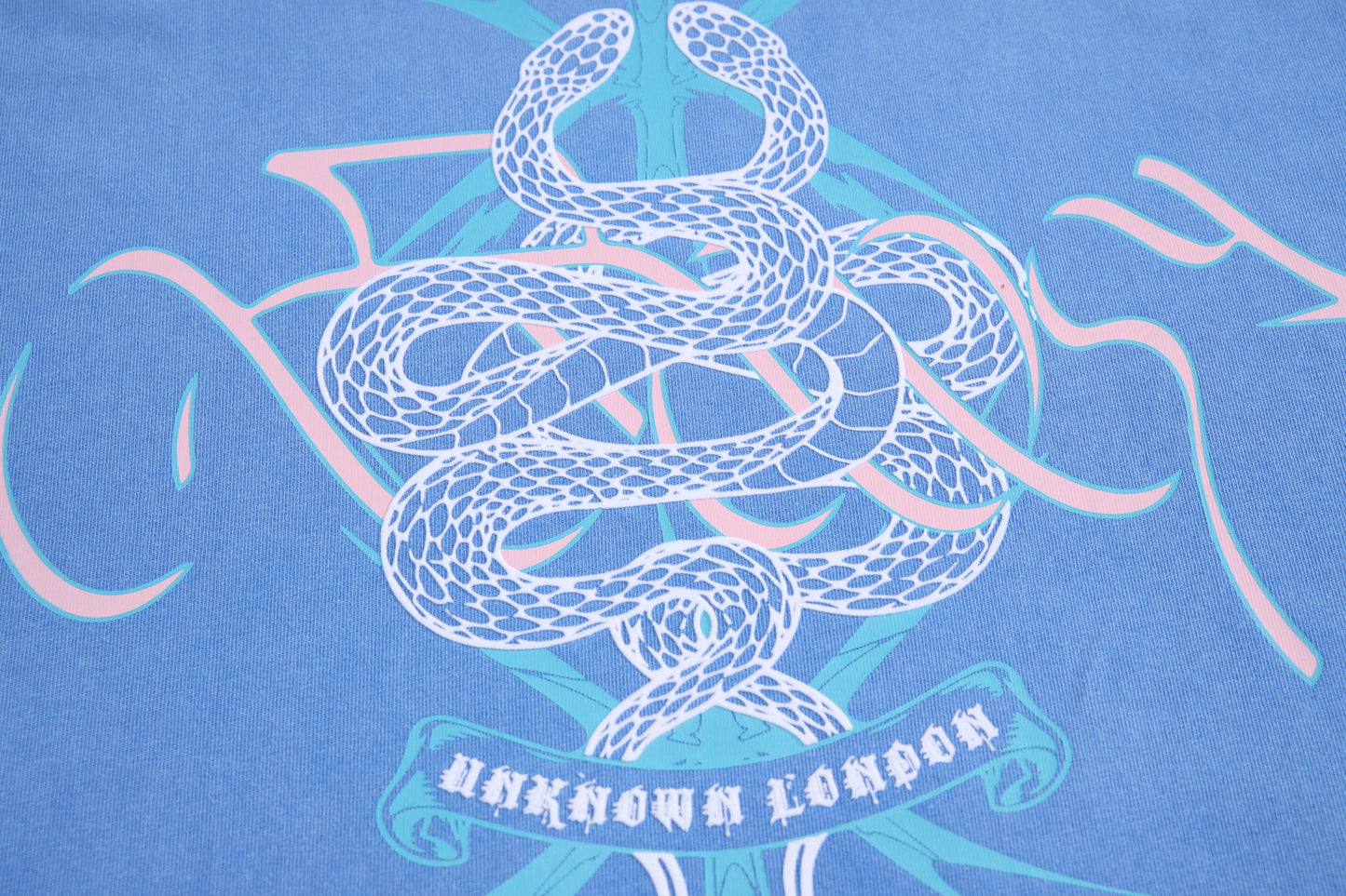 ACID WASHED TWISTED SNAKE TEE