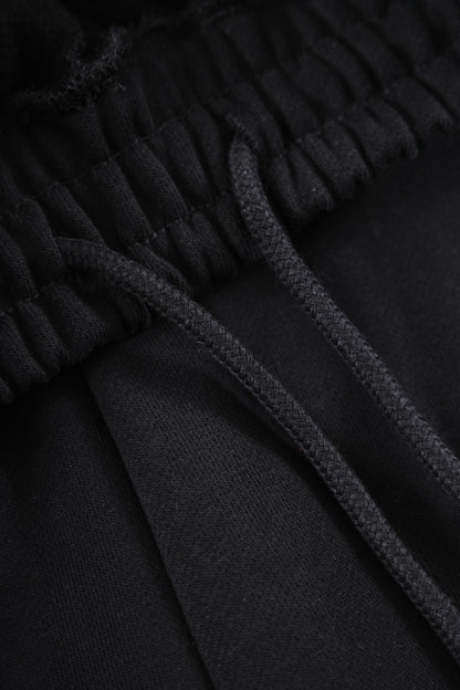 BLACKOUT WRAP EMBROIDERY JOGGERS