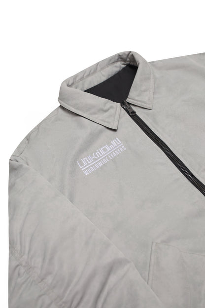 REVERSIBLE CAMO BOMBER JACKET