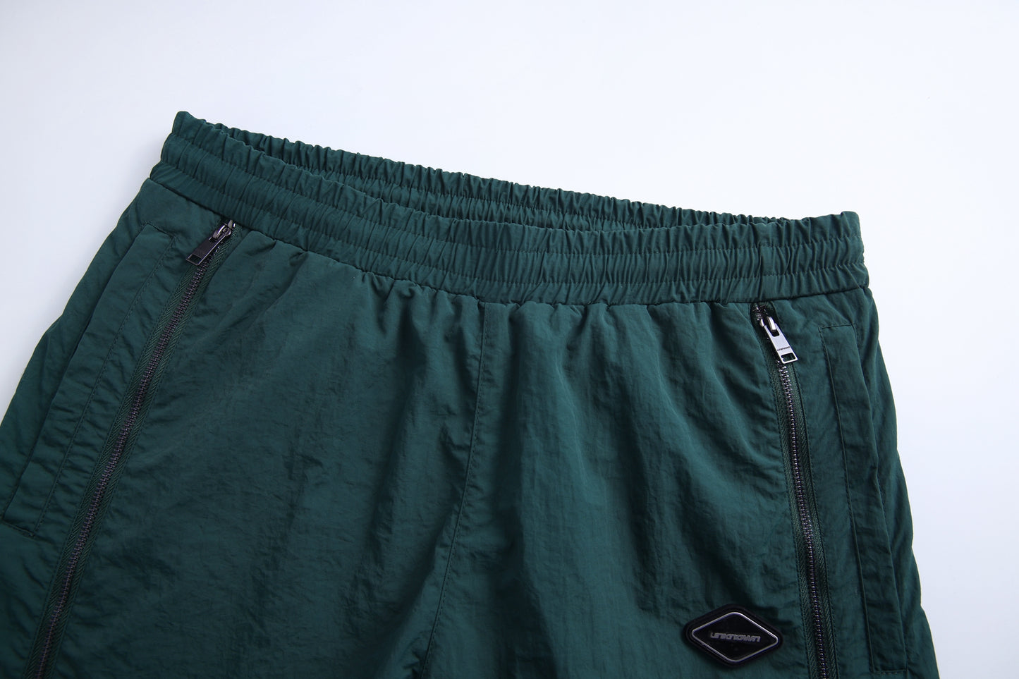 GREEN TRACK PANTS